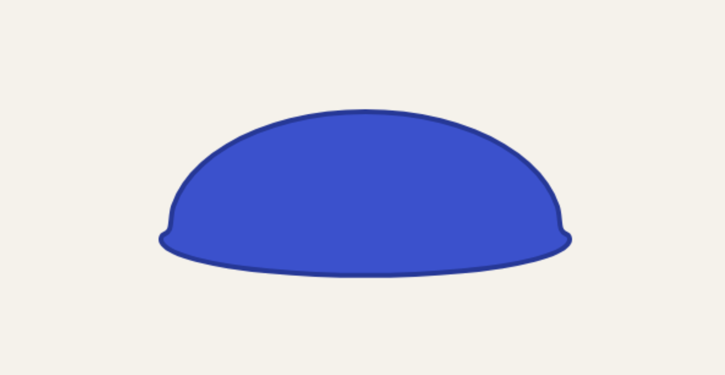 An early version of the goo grotto slime shape: a rounded blob with small nubby feet at the bottom